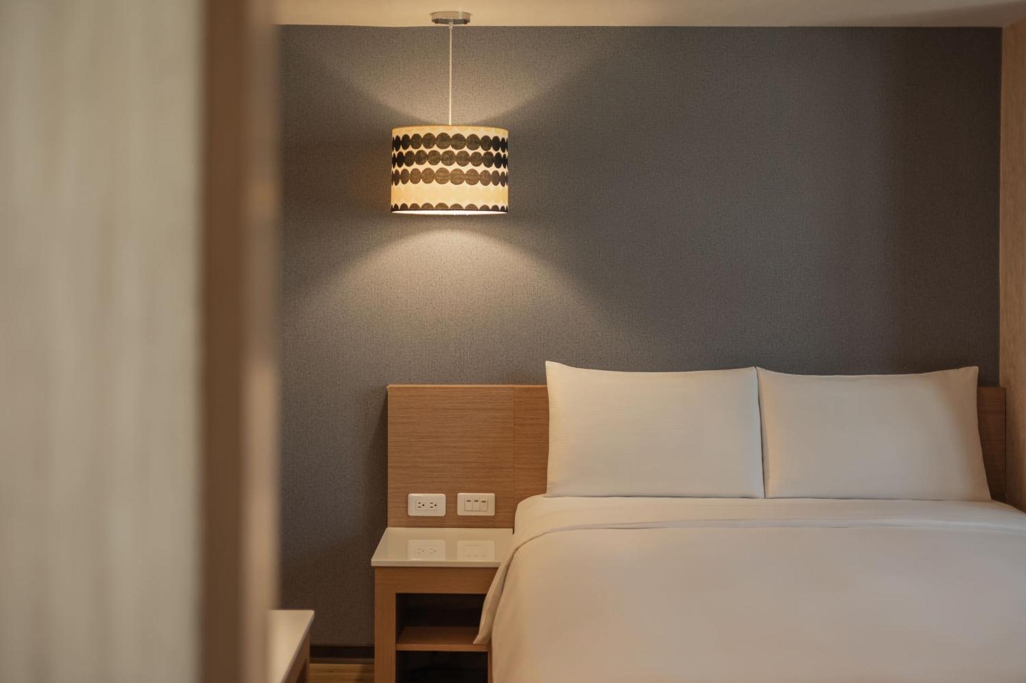 Kindness Hotel - Tainan Chihkan Tower Номер фото