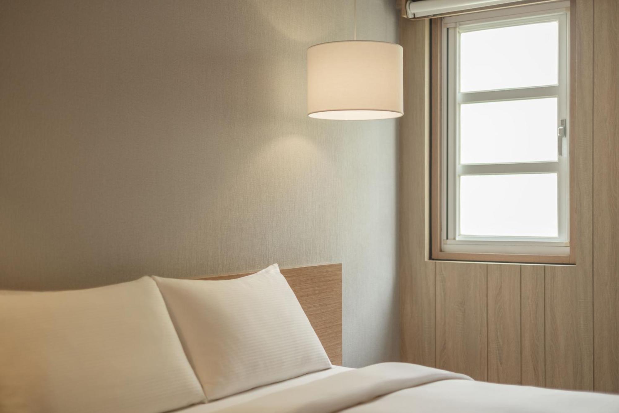Kindness Hotel - Tainan Chihkan Tower Номер фото