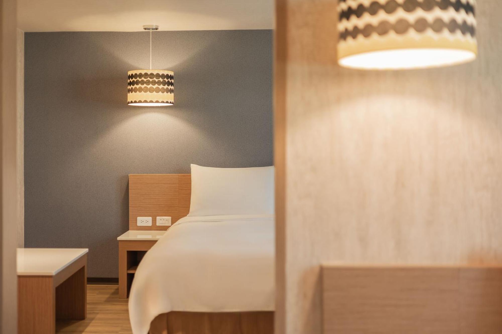 Kindness Hotel - Tainan Chihkan Tower Номер фото