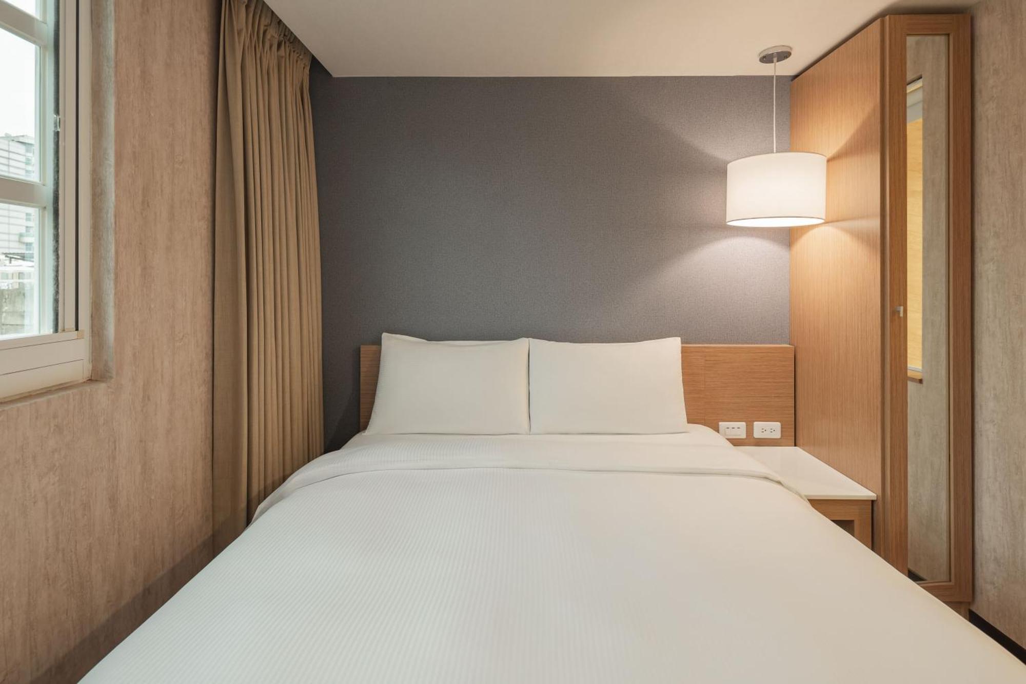 Kindness Hotel - Tainan Chihkan Tower Номер фото